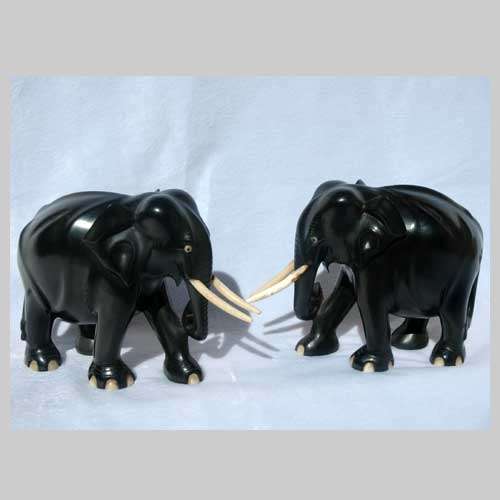 TWO EBONY ELEPHANT FIGURINES. Vintage (1920s / 1930s). Hand carved.