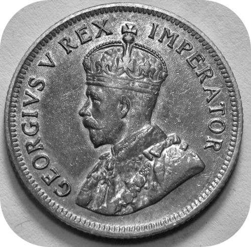 RARE specimen!:  1929 Shilling in A/UNC with loads of history!