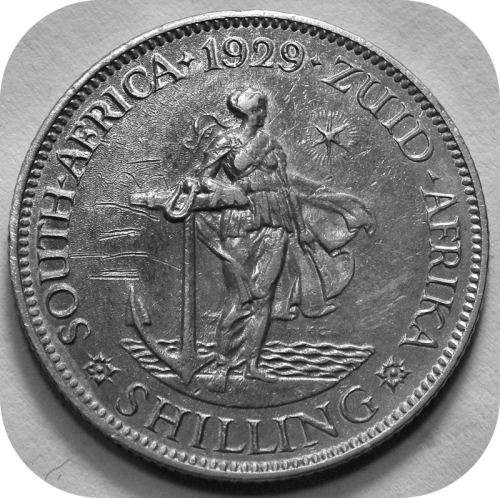 RARE specimen!:  1929 Shilling in A/UNC with loads of history!
