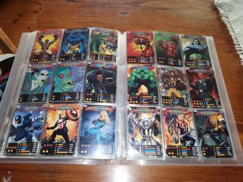 Different Spiderman collectables, figurine/trading cards