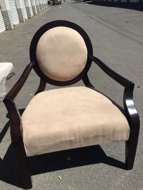 Smooth creme wingback chair