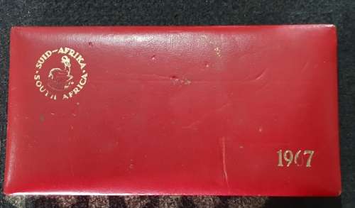 1967 Proof Coin set in red mint box. Toning on R1