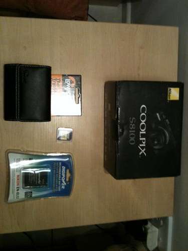 Nikon Coolpix S8100 with: 4Gb SD card, pouch, extra battery