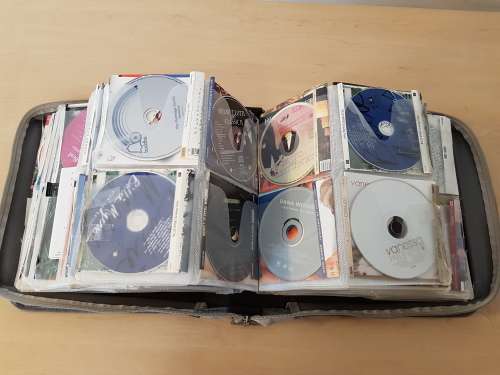 240+ Original CDs with booklets in Carry Case (Various Genres)