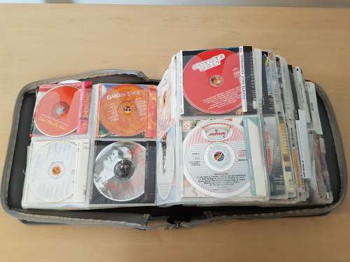 240+ Original CDs with booklets in Carry Case (Various Genres)