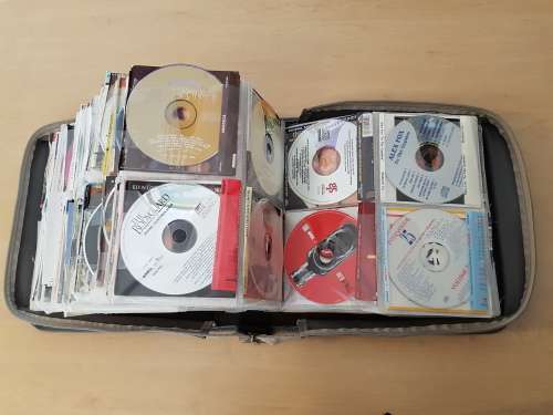 240+ Original CDs with booklets in Carry Case (Various Genres)