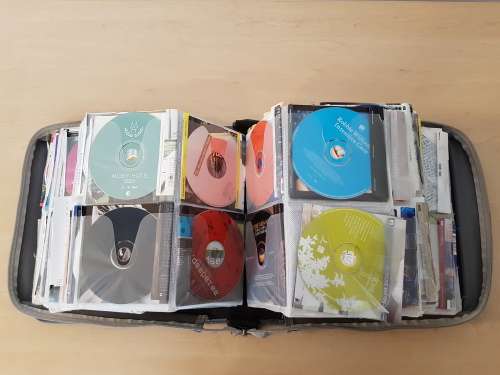 240+ Original CDs with booklets in Carry Case (Various Genres)