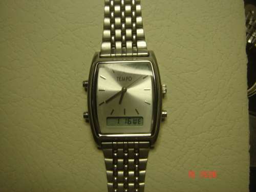 EXCELLENT TEMPO QUARTS WITH ANALOG AND DIGITAL TIME ALSO DATE,ALARM,STOPWATCH AND LIGHT NO SCRATCHES