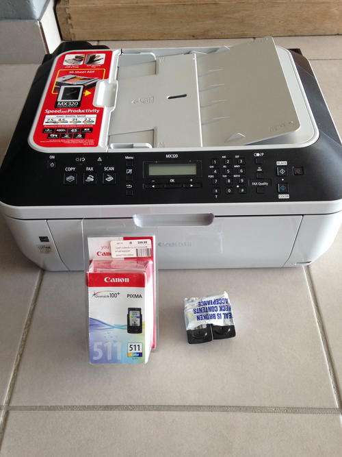 Cannon MX320 printer, fax ,scanner with new cartridge (courier or collect only)