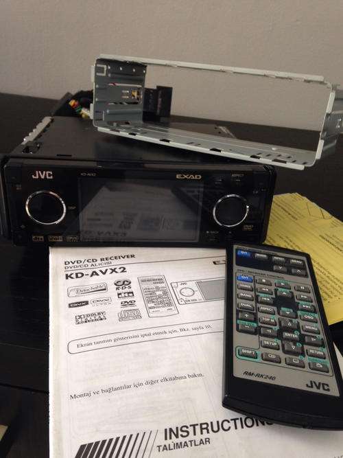 JVC DVD / CD receiver KD - AVX2, with remote, booklet, and tray.