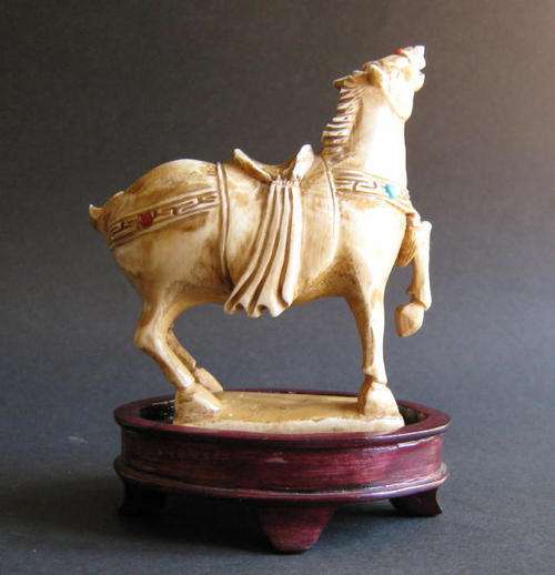 ANTIQUE CARVED IVORY CHINESE TANG STYLE HORSE ON WOODEN STAND