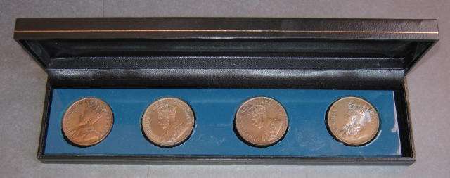 1930 KING GEORGE V PENNY x 4 IN PRESENTATION BOX