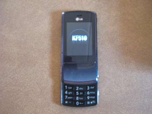 **** RELISTED [time wasters]*** LG KF510 CELL PHONE IN BOX + SOLAR BLUE TOOTH KIT staring at R1