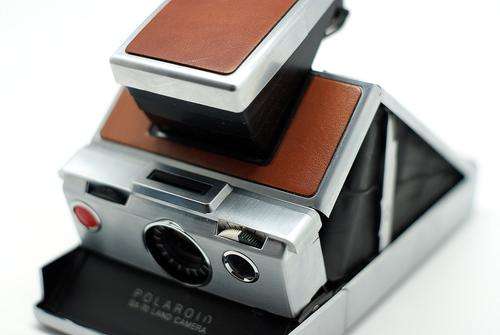 Polaroid SX 70 Land Camera - an all time design classic!!!! + amazing leather bag.