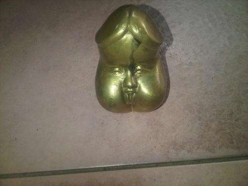 Brass Art Sculpture Of The Pinis With A Face