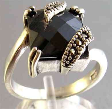 925 Sterling Silver Marcasite and Faceted cut Black Onyx Ring.