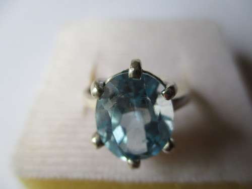 925 Sterling Silver and Genuine Blue Topaz Ring.