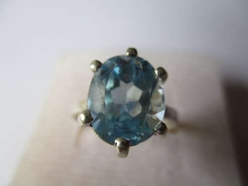 925 Sterling Silver and Genuine Blue Topaz Ring.