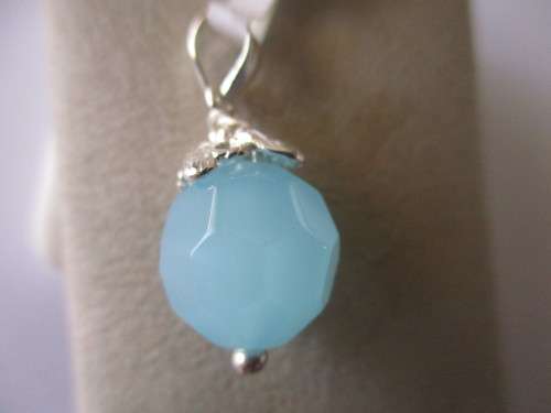 925 Sterling Silver and Blue Topaz Pendant.