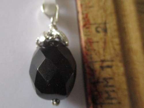 925 Sterling Silver and Black Onyx Pendant.