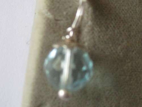 925 Sterling Silver and Blue topaz Pendant.