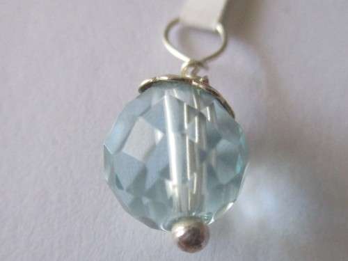 925 Sterling Silver and Blue topaz Pendant.