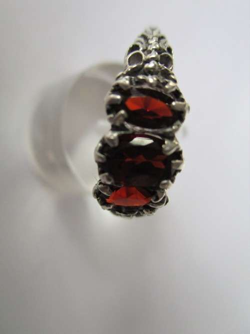 925 Sterling Silver  and genuine Garnets Ring