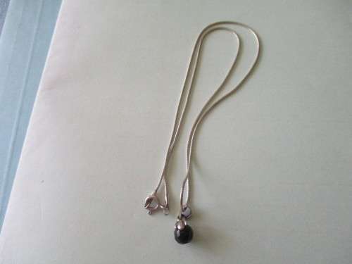 Sterling Silver chain and black onyx pendant on