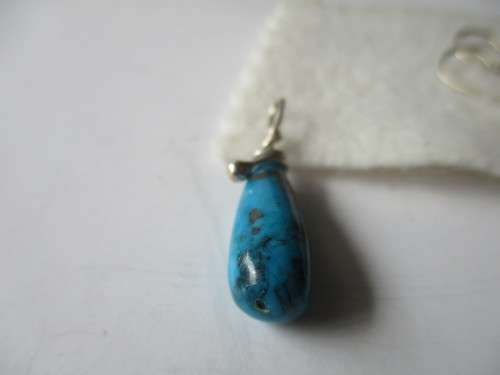 Sterling Silver and genuine Turquoise Pendant
