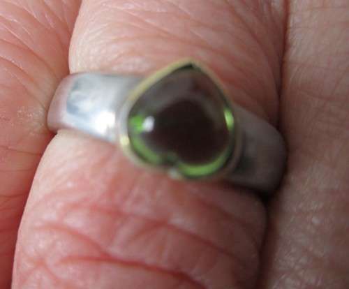 925 Sterling Silver and Genuine Heart cut Peridot Ring.