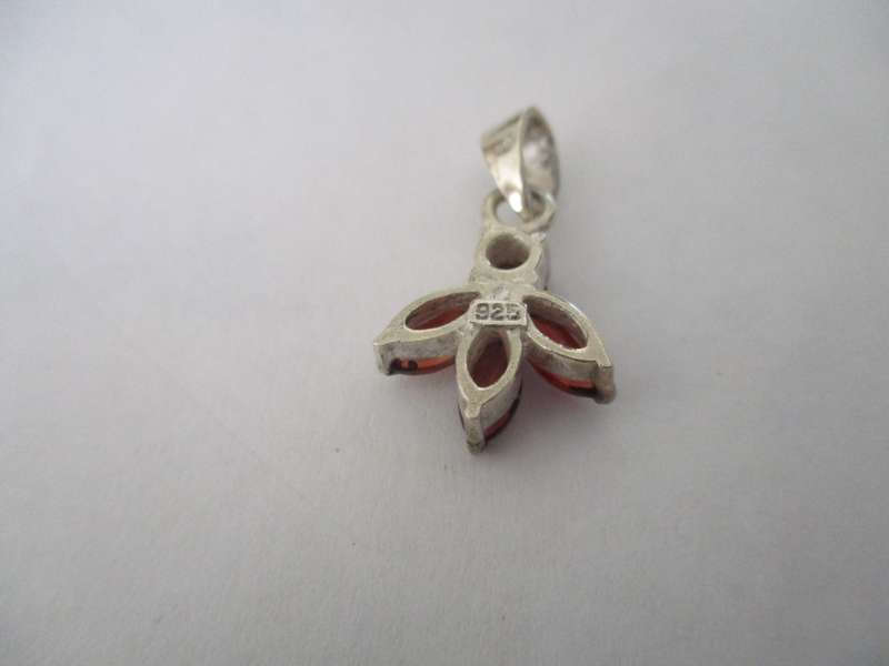 Sterling Silver and Genuine Garnets Pendant