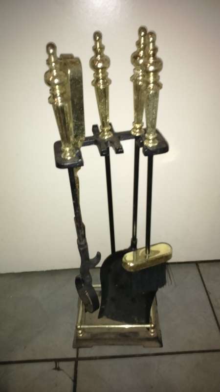 vintage fire place set on stand with coal scuttle