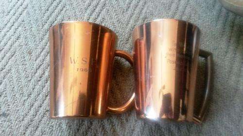 pair of copper plated vintage mugs
