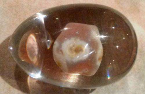 vintage lucite sphere with gemstone/rose quartz insde (egg sized)