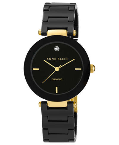 the trend in this highly fashionable Anne Klein watch featuring a black ceramic bracelet with gold-
