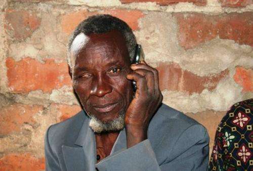 Old blind man listen to the Word of God