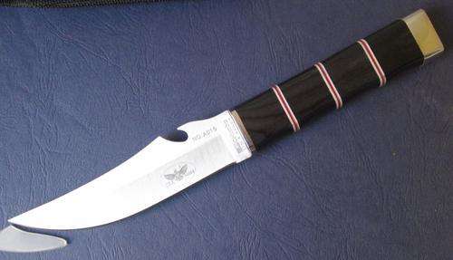 USA SABER KNIFE by COLUMBIA with RIBBED LAMINATED HANDLE & BOTTLE OPENER & SHEATH .