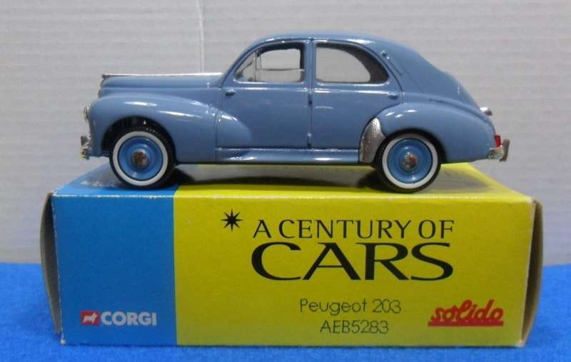 SOLIDO 1953 PEUGEOT 203 - " A CENTURY OF CARS SERIES "  MINT BOXED                               .