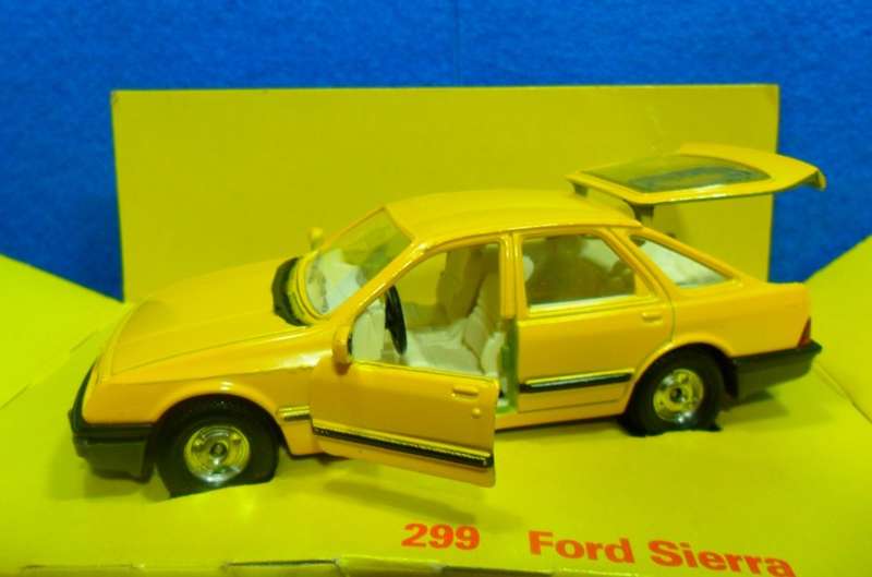 RARE CORGI 299 FORD SIERRA 2.3 GHIA ( MADE IN GT BRITAIN ) MINT WITH FAIR TO POOR ORIGINAL BOX