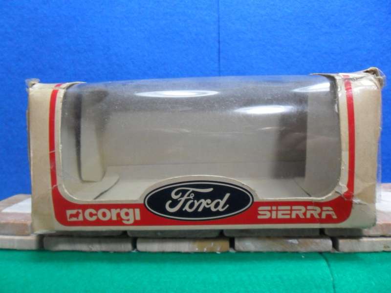 RARE CORGI 299 FORD SIERRA 2.3 GHIA ( MADE IN GT BRITAIN ) MINT WITH FAIR TO POOR ORIGINAL BOX