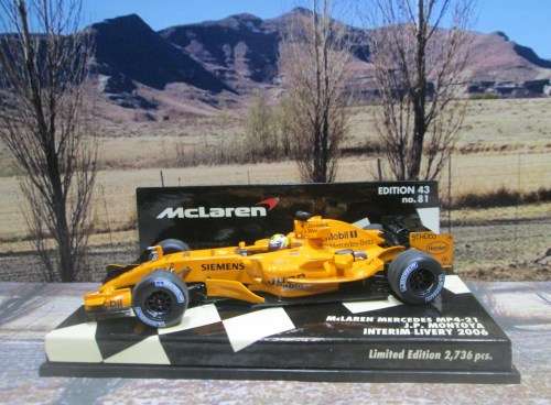 LTD EDIT MINICHAMPS 530 064374 - 2006 McLAREN MERCEDES MP4 -21  `J.P. MONTOYA ` MINT IN DISPLAY CASE