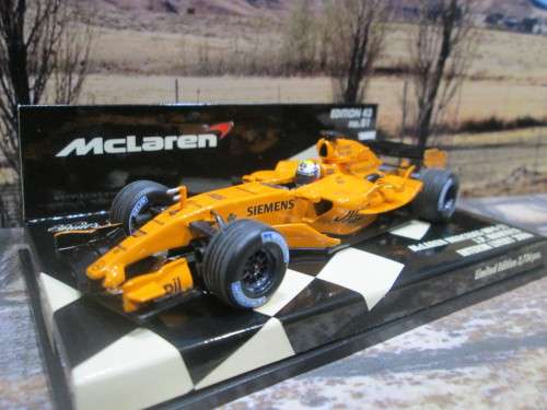 LTD EDIT MINICHAMPS 530 064374 - 2006 McLAREN MERCEDES MP4 -21  `J.P. MONTOYA ` MINT IN DISPLAY CASE