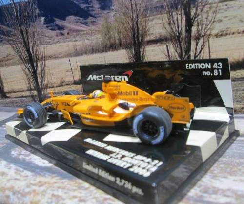 LTD EDIT MINICHAMPS 530 064374 - 2006 McLAREN MERCEDES MP4 -21  `J.P. MONTOYA ` MINT IN DISPLAY CASE