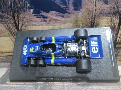 ATLAS / IXO  - 1976  TYRRELL P34  6 WHEELER    `JODY SCHECKTER `   ` MINT - BOX AND DISPLAY CASE