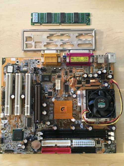 Gigabyte GA6IEM Rev 1.1 Motherboard Includes Intel Celeron 1.1Ghz Processor & 128MB PC133 RAM.