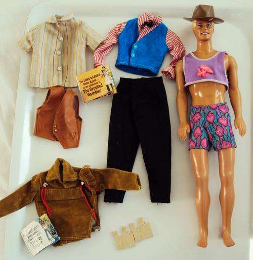 MATTEL MALE DOLL WITH VARIOUS OUTFITS