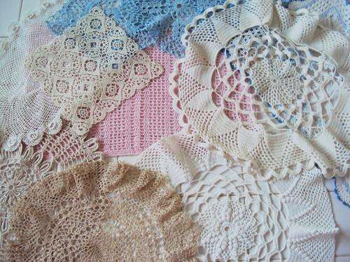 Interesting assortment of hand crochet doilies, tray cloths, various colours & sizes (11 pieces)