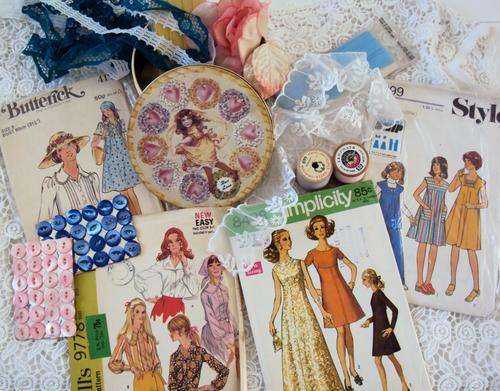 Vintage sewing items, wood cotton reels, lace bits, MOP buttons, patterns