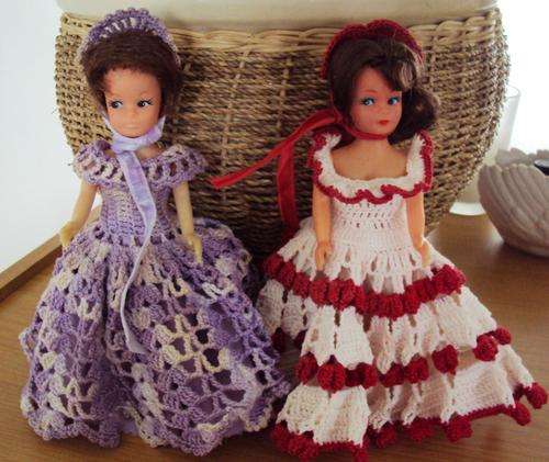 Two little ladies dressed in crochet frilly dresses with shoes (made in Hong Kong) 19.5cm tall