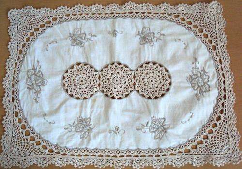 Unusual doily with embroidery and hand crochet inserts and edging